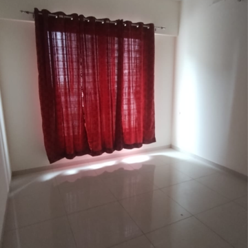 Bedroom in 2 BHK Apartment at Kolte Patil R10, Marunji – for Rent