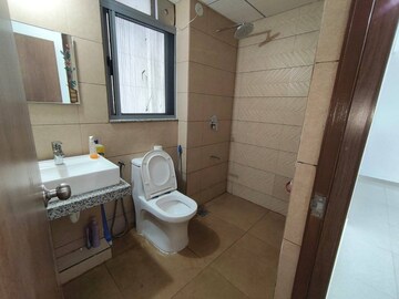 Bathroom in 2 BHK Apartment at Kalpataru Immensa, Kolshet Road – for Rent