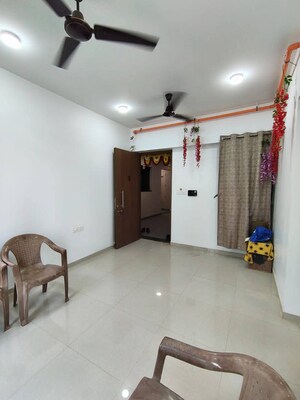 Living Room in 2 BHK Apartment at Kalpataru Immensa, Kolshet Road – for Rent