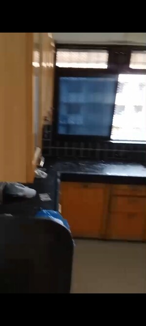 Kitchen in 1 BHK Apartment at Ajay Sahawas Apartment, Vile Parle East – for Rent