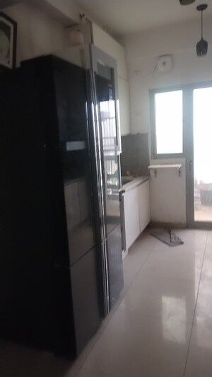 Kitchen in 3 BHK Apartment at Gulshan Bellina, Sector 16 Greater Noida – for Rent