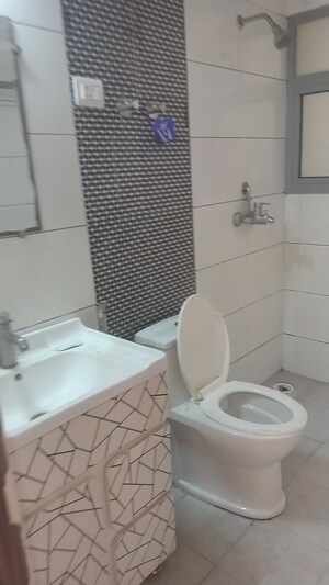Bathroom in 2 BHK Apartment at Gulshan Bellina, Sector 16 Greater Noida – for Rent