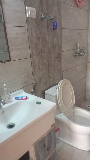 Bathroom in 2 BHK Apartment at Gulshan Bellina, Sector 16 Greater Noida – for Rent