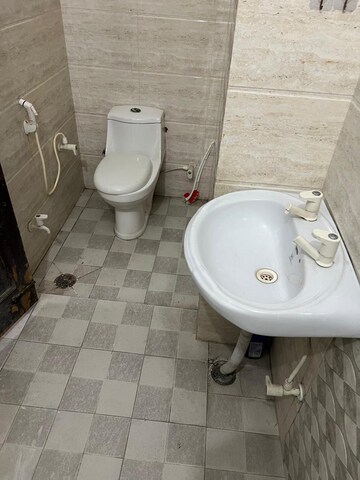 Bathroom in 1.5 BHK Independent House at RWA Apartments Sector 27, Sector 27 – for Rent