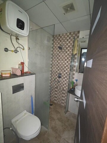 Bathroom in 3 BHK Apartment at Gaur Saundaryam, Tech Zone 4 Greater Noida – for Rent