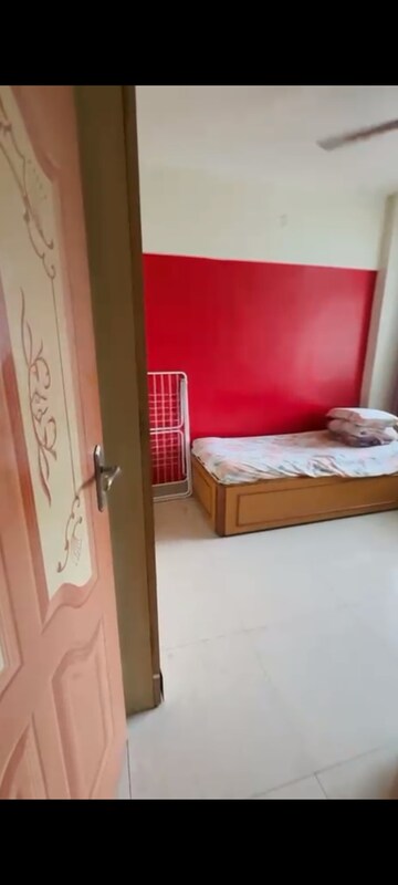 Bedroom in 2 BHK Apartment at Satellite Garden, Goregaon East – for Rent