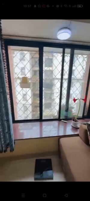 Bedroom in 2 BHK Apartment at Satellite Garden, Goregaon East – for Rent