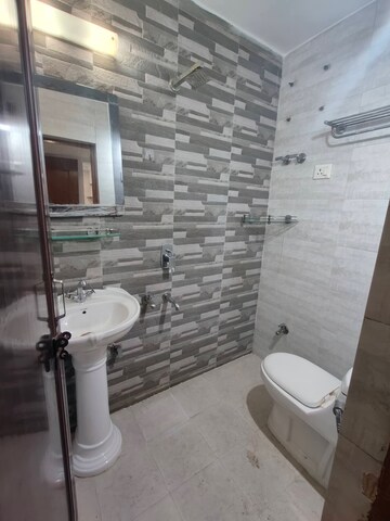Bathroom in 3 BHK Apartment at Maidan Garhi – for Rent