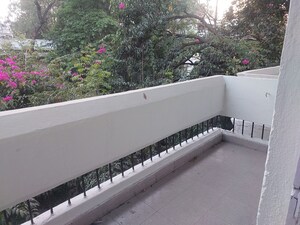 Balcony in 3 BHK Apartment at New Chanakya CHS, Boat Club Road – for Rent