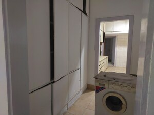 Bathroom in 3 BHK Apartment at New Chanakya CHS, Boat Club Road – for Rent