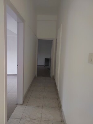 Kitchen in 3 BHK Apartment at New Chanakya CHS, Boat Club Road – for Rent