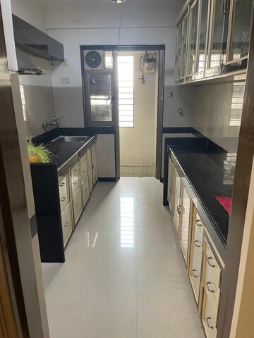 Kitchen in 2 BHK Apartment at Gokuldham Colony – for Sale