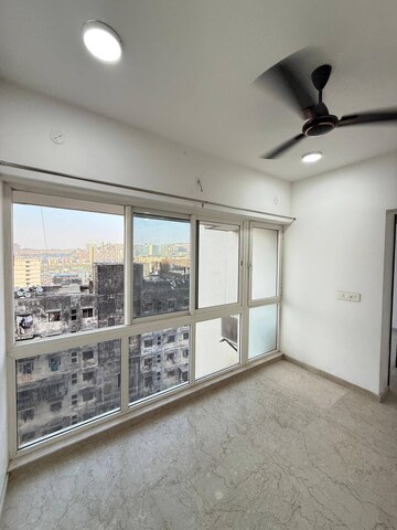 Room in 2 BHK Apartment at Omkar Ananta, Goregaon East – for Rent