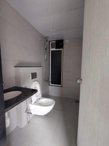 Bathroom in 2 BHK Apartment at Rama Livmo, Hinjewadi – for Rent