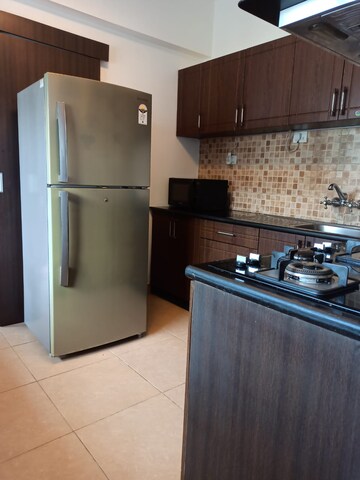 Kitchen in 2 BHK Apartment at Godrej Woodsman Estate, Hebbal – for Rent