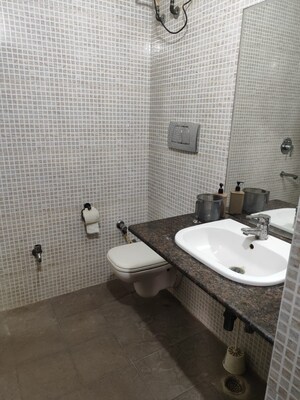 Bathroom in 1 RK Independent House at RWA Apartments Sector 19, Sector 19 – for Rent
