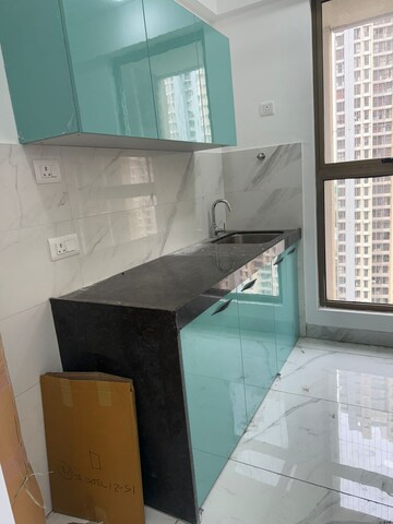 Kitchen in 1 BHK Apartment at Raymond Ten X Habitat, Pokhran Road No Two – for Sale