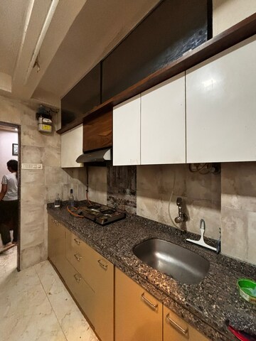 Kitchen in 1.5 BHK Apartment at Andheri West – for Rent