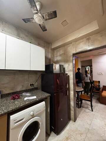 Kitchen in 1.5 BHK Apartment at Andheri West – for Rent