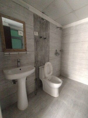 Bathroom in 2 BHK Apartment at Gulshan Bellina, Sector 16 Greater Noida – for Rent