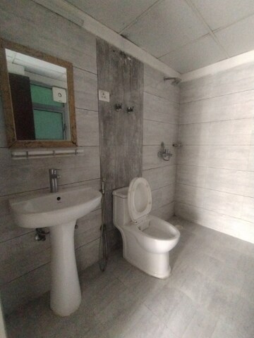 Bathroom in 2 BHK Apartment at Gulshan Bellina, Sector 16 Greater Noida – for Rent