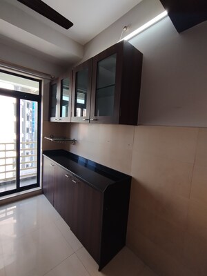 Kitchen in 3 BHK Apartment at Ghodbunder Road – for Rent