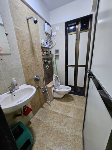 Bathroom in 1 BHK Apartment at Swaraj Planet, Kopar Khairane – for Rent