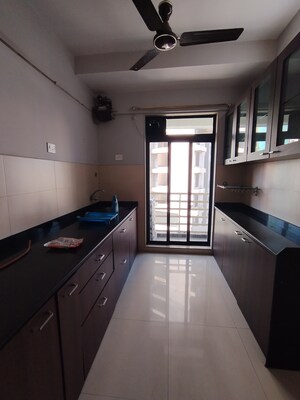 Kitchen in 3 BHK Apartment at Ghodbunder Road – for Rent
