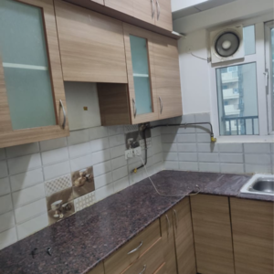 Kitchen in 2 BHK Apartment at Gaur 14th Avenue High Street, Panchsheel Green – for Rent