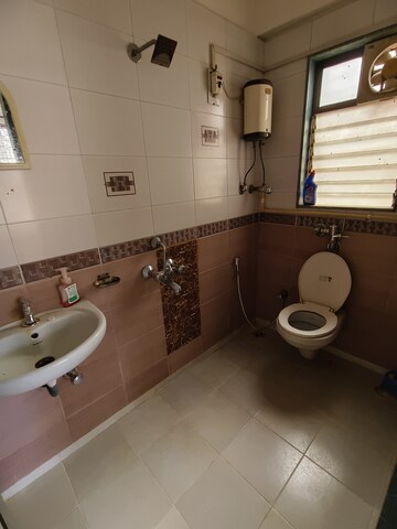 Bathroom in 2 BHK Apartment at Sadguru Complex I, Goregaon East – for Rent