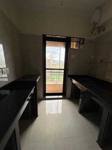 Kitchen in 2 BHK Apartment at Raheja Interface Heights, Malad West – for Sale