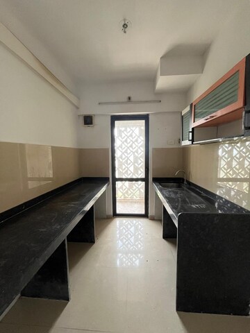 Kitchen in 1.5 BHK Apartment at Lodha Palava City Lakeshore Greens, Dombivli East – for Sale
