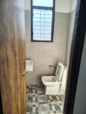 Bathroom in 3 BHK Builder Floor at Dhakoli – for Sale