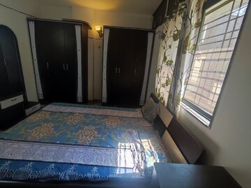 Bedroom in 2 BHK Apartment at Aishwarya Laxmi, Wagholi – for Rent
