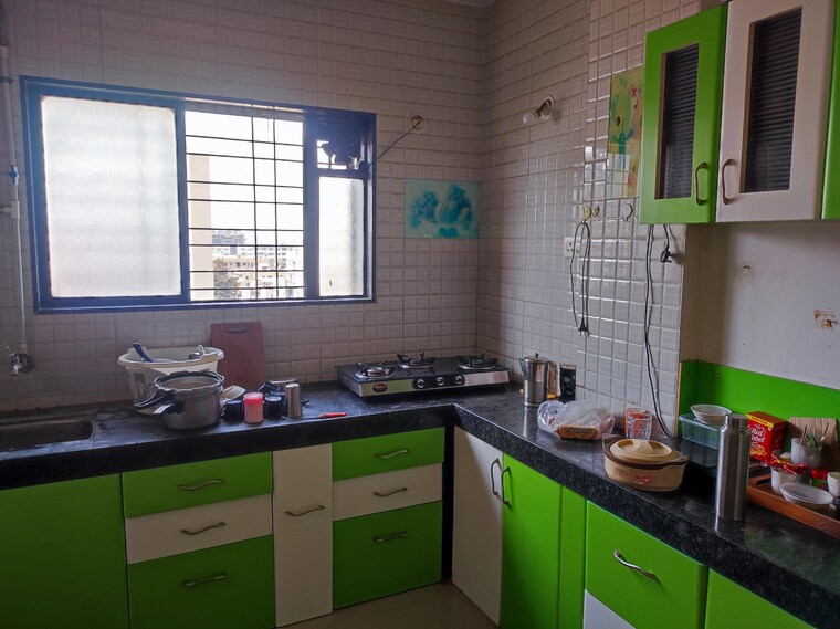 Kitchen, aishwarya-laxmi 2 Bedroom 910 Sq.Ft. Apartment In Wagholi Pune 9688739