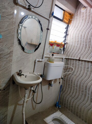 Bathroom in 2 BHK Apartment at Aishwarya Laxmi, Wagholi – for Rent