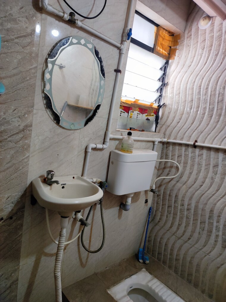 Bathroom, aishwarya-laxmi 2 Bedroom 910 Sq.Ft. Apartment In Wagholi Pune 9688739