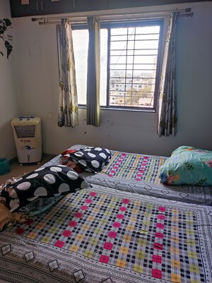 Bedroom in 2 BHK Apartment at Aishwarya Laxmi, Wagholi – for Rent