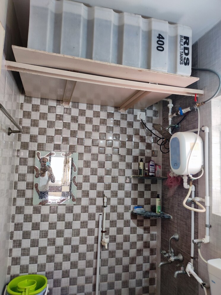 Bathroom, aishwarya-laxmi 2 Bedroom 910 Sq.Ft. Apartment In Wagholi Pune 9688739