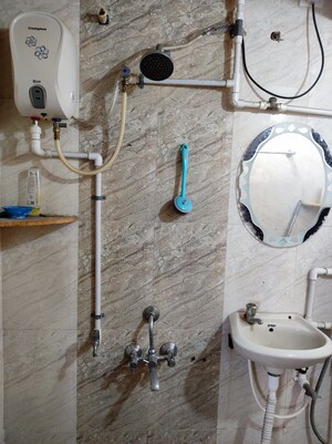 Bathroom in 2 BHK Apartment at Aishwarya Laxmi, Wagholi – for Rent