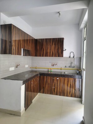 Kitchen in 2 BHK Apartment at Eureka Diya Green City, Raj Nagar Extension – for Rent