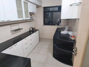 Kitchen in 3 BHK Apartment at Spring Leaf 6 CHS, Kandivali East – for Sale