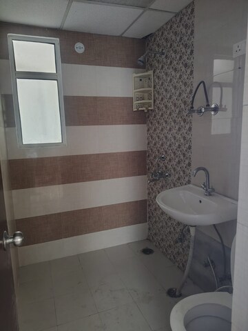 Bathroom in 2 BHK Apartment at Eureka Diya Green City, Raj Nagar Extension – for Rent