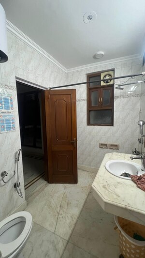 Bathroom in 3 BHK Builder Floor at Defence Colony – for Rent