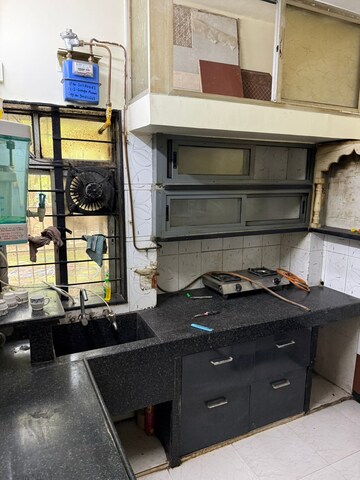 Kitchen in 2 BHK Apartment at Ganga Puram CHS, Viman Nagar – for Rent