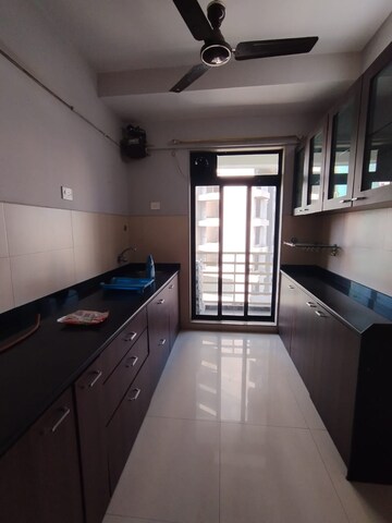 Kitchen in 3 BHK Apartment at Vijay Residency II, Ghodbunder Road – for Rent