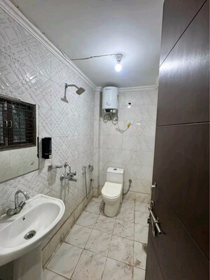 Bathroom in 2 BHK Builder Floor at Chattarpur – for Rent