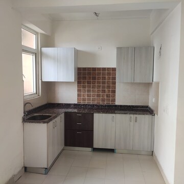 Kitchen in 3 BHK Apartment at Amrapali Zodiac, Sector 120 – for Rent