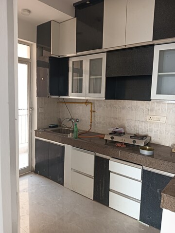 Kitchen in 3 BHK Apartment at ATS Allure, Sector 22d Yamuna Expressway – for Rent