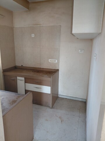 Kitchen in 1.5 BHK Apartment at Dosti West County, Balkum Pada – for Sale